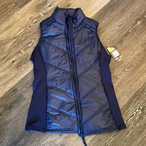 navy blue zip up athletic vest.